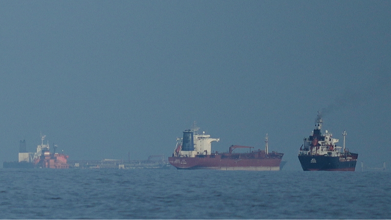 Oil tankers and cargo ships line up in the Strait of Hormuz as seen from Mina Al Fajer, United Arab Emirates, March 11, 2026. /VCG