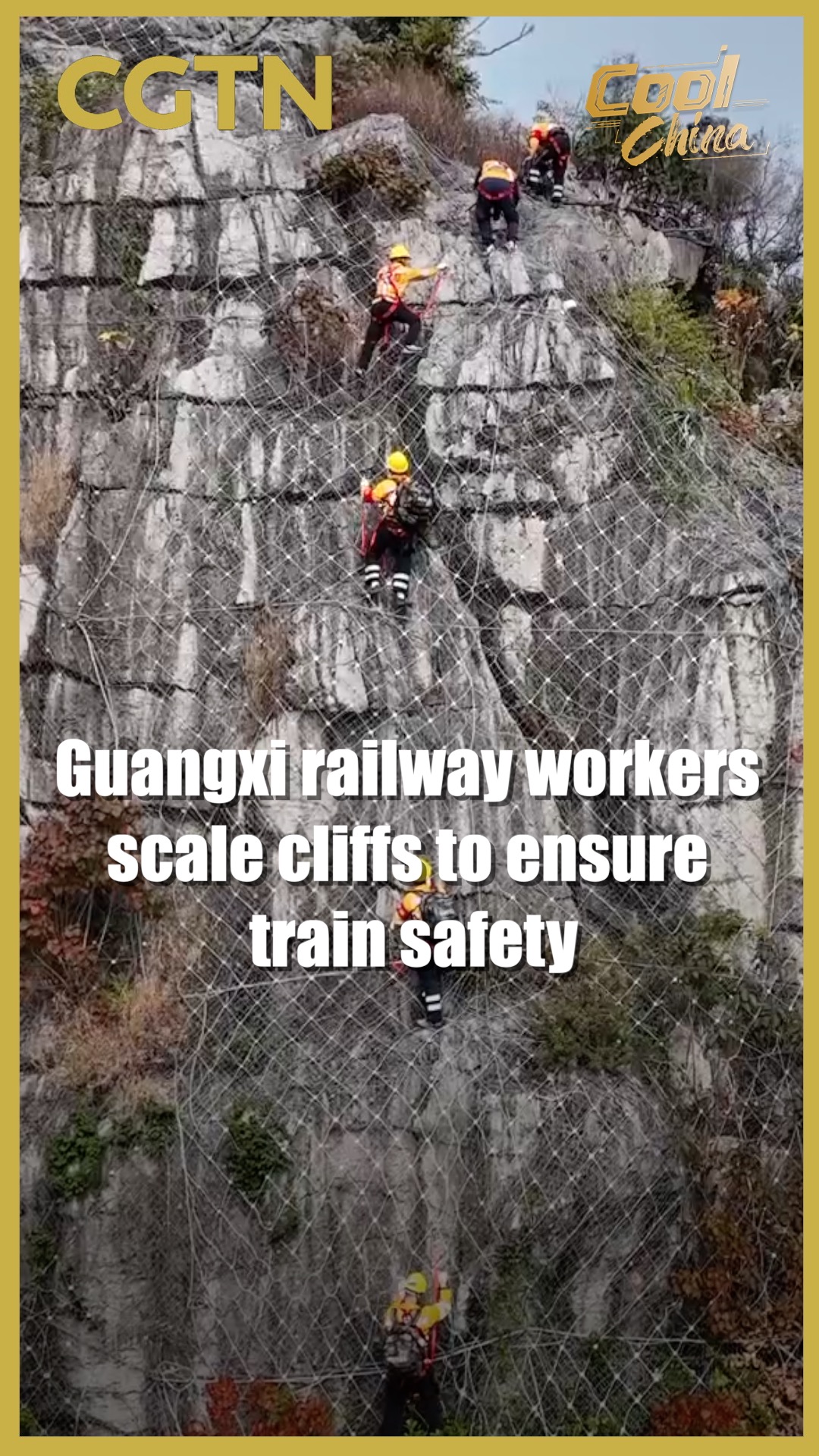 Guangxi railway workers scale cliffs to ensure train safety