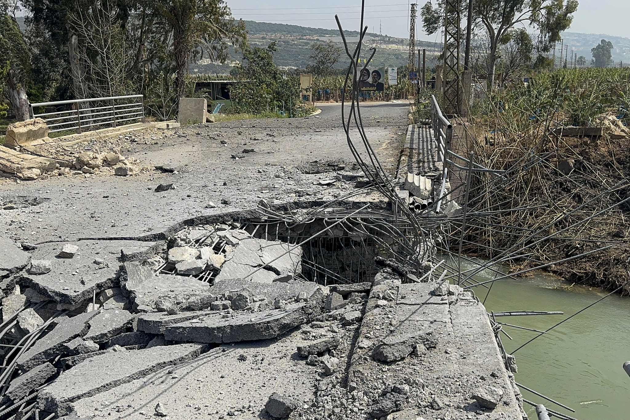 A view of the significant structural damage to the Qasmiyeh Bridge over the Litani River in the countryside of Tyre, Lebanon, on March 19, 2026. /VCG