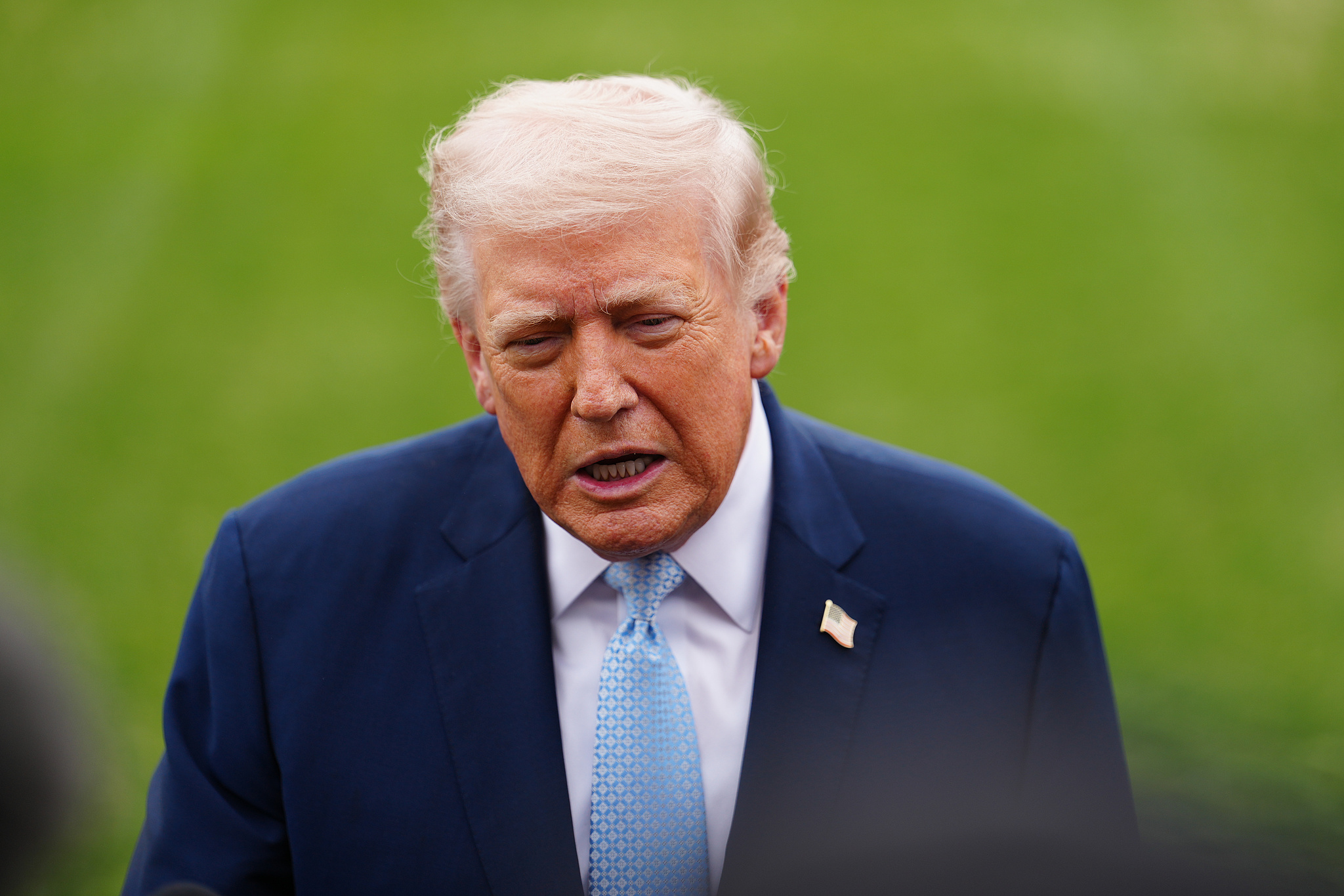 US President Donald Trump speaks with reporters before departing on Marine One from the South Lawn of the White House in Washington, D.C., March 20, 2026. /VCG