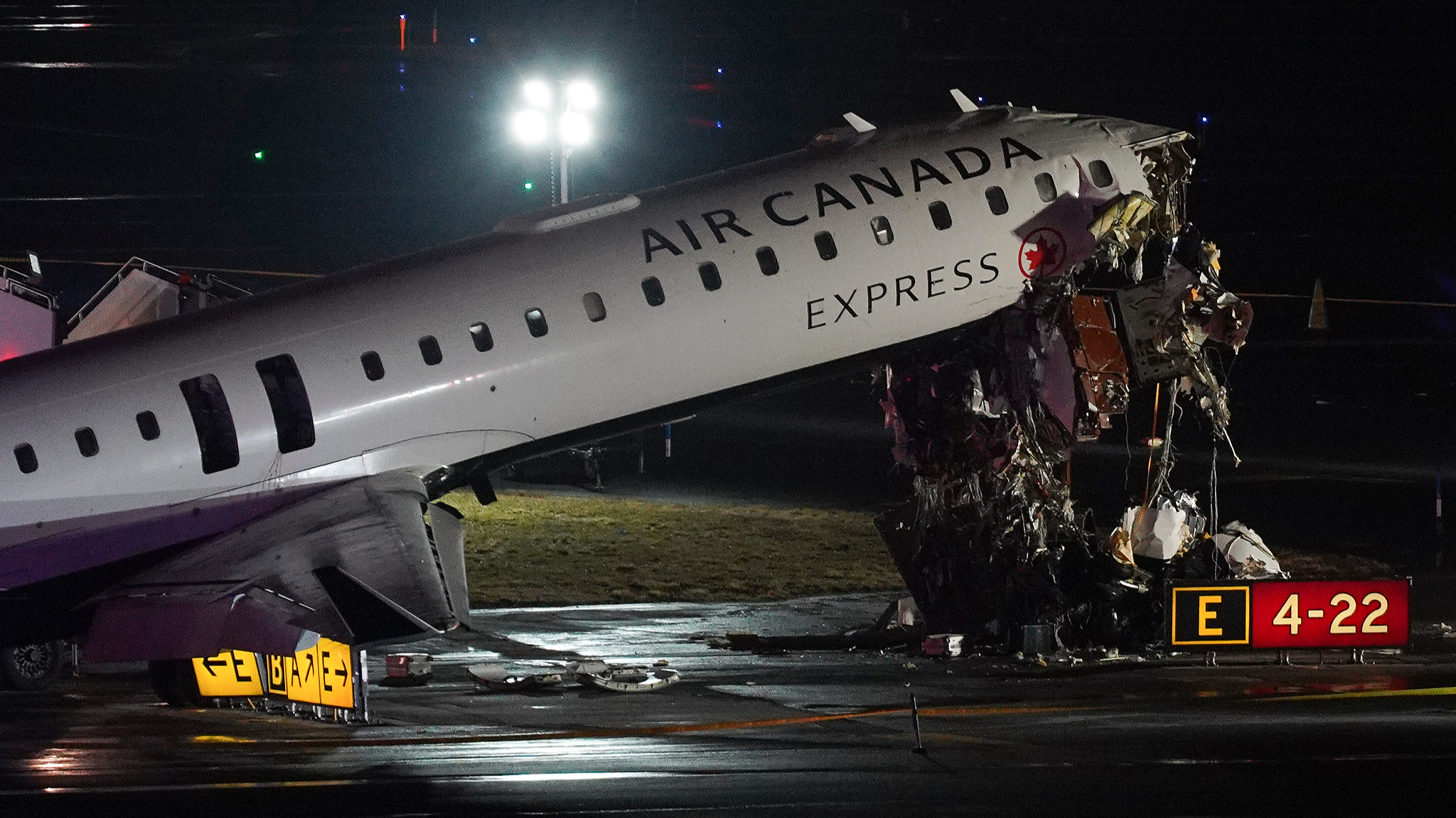 An Air Canada Jet sits on the runway at LaGuardia Airport after colliding with a Port Authority aircraft rescue and firefighting vehicle after landing in New York, March 23, 2026. /VCG