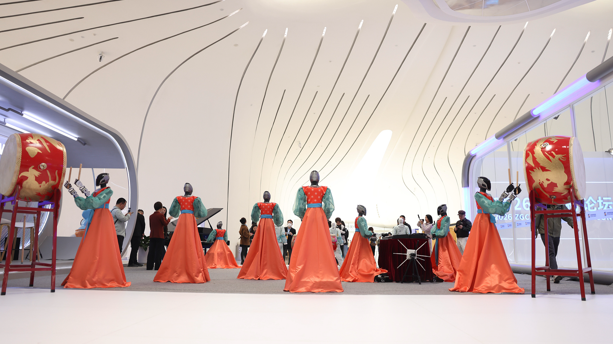 A robot band and dancing robots perform during the 2026 Zhongguancun Forum in Beijing, China, March 24, 2026. /VCG