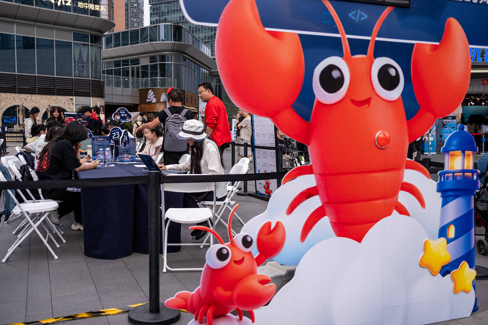 An installation event hosted by Chinese tech giant Tencent to help people install the personal AI assistant OpenClaw onto their computers in Shenzhen, China, March 21, 2025. /VCG