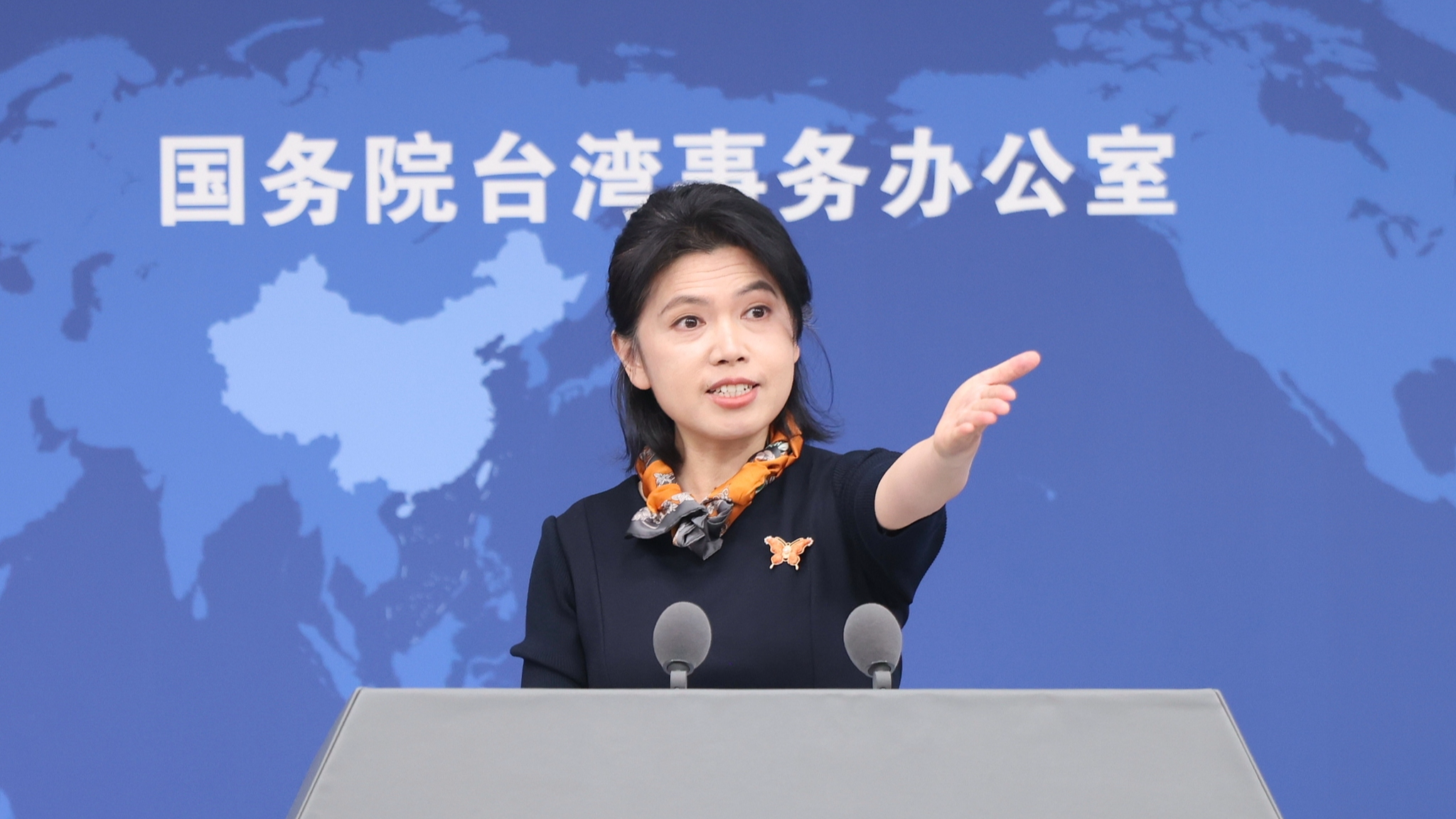 Zhu Fenglian, a spokesperson for the State Council Taiwan Affairs Office, speaks at a press conference in Beijing, March 25, 2026. /VCG
