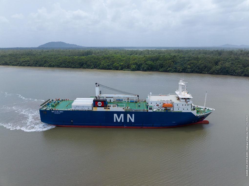 The cargo vessel Colibri crosses the Atlantic Ocean and sails along the Kourou River. /ESA