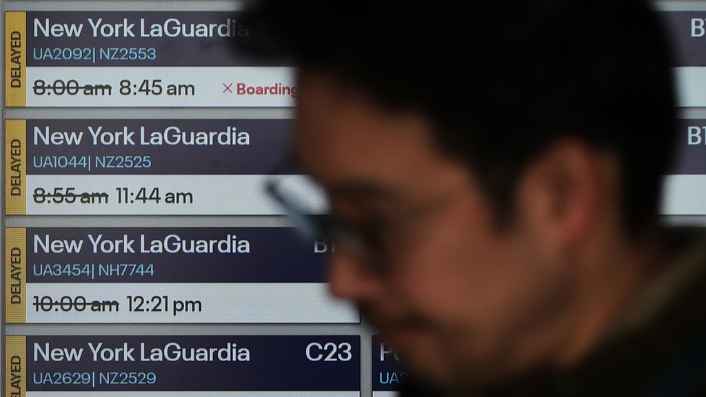 Delayed flight times are displayed at O'Hare International Airport in Chicago, the US, March 24, 2026. /VCG