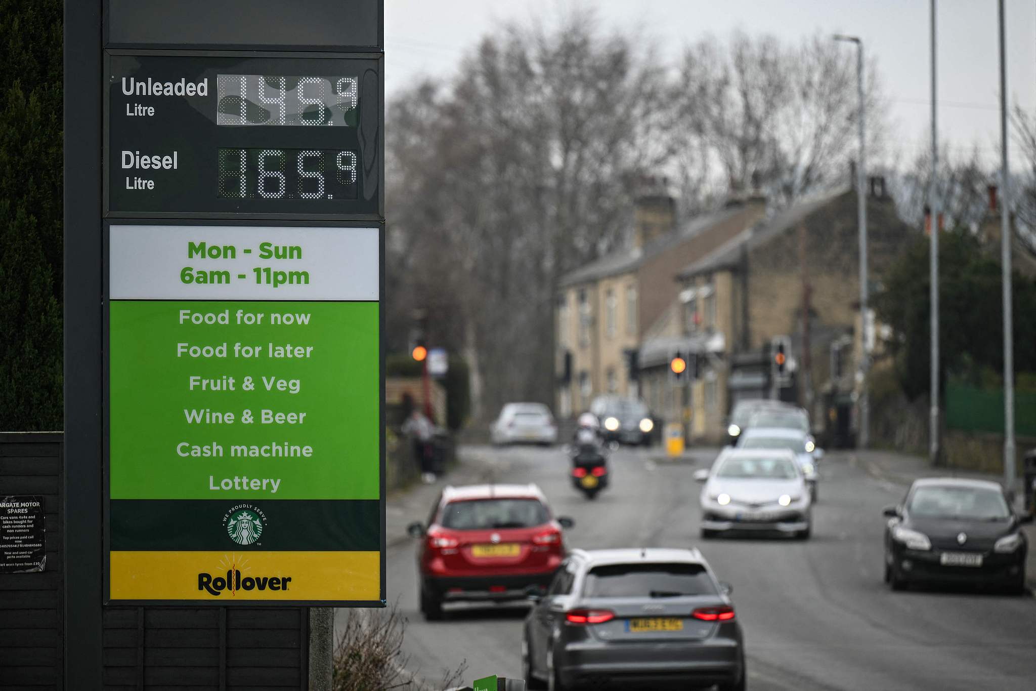 A signboard showing prices for petrol and diesel at a petrol service station in Huddersfield, northern England, March 19, 2026. /VCG