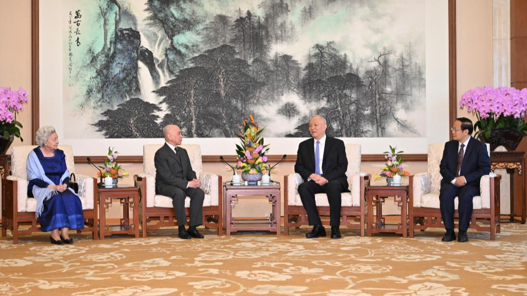 Cai Qi (2nd R), a member of the Standing Committee of the Political Bureau of the CPC Central Committee and a member of the Secretariat of the CPC Central Committee, meets with Cambodian King Norodom Sihamoni (2nd L) and Queen Mother Norodom Monineath Sihanouk (L) in Beijing, capital of China, March 25, 2026. /Xinhua