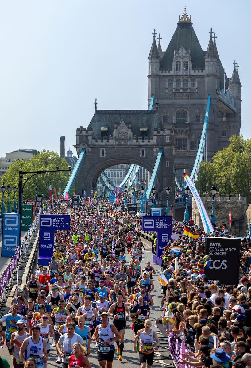 Thousands of runners stream across London's iconic Tower Bridge during the 2025 TCS London Marathon. /TCS London Marathon