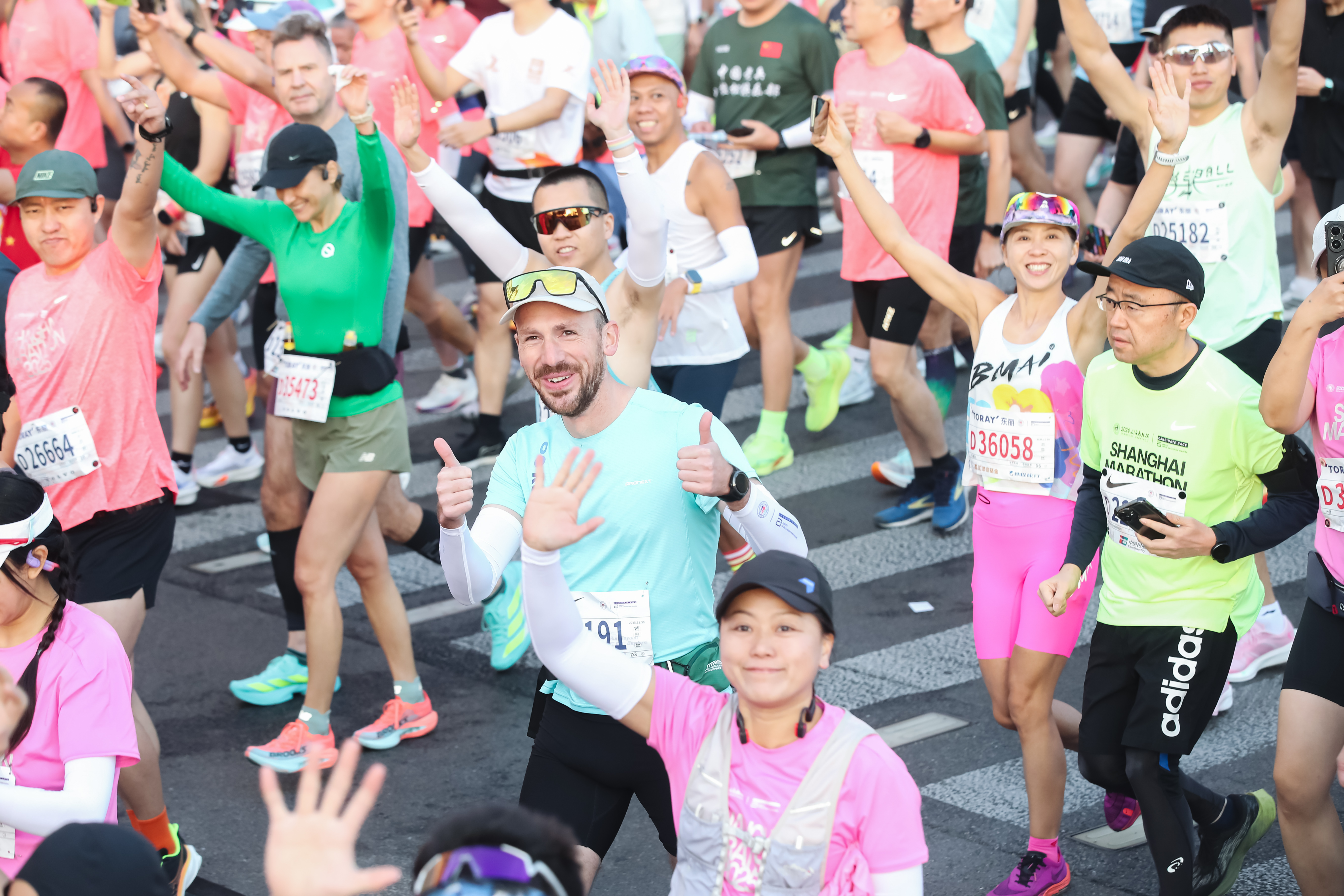It is a sea of smiles at the 2025 Shanghai Marathon as runners find their rhythm. /Shanghai Marathon