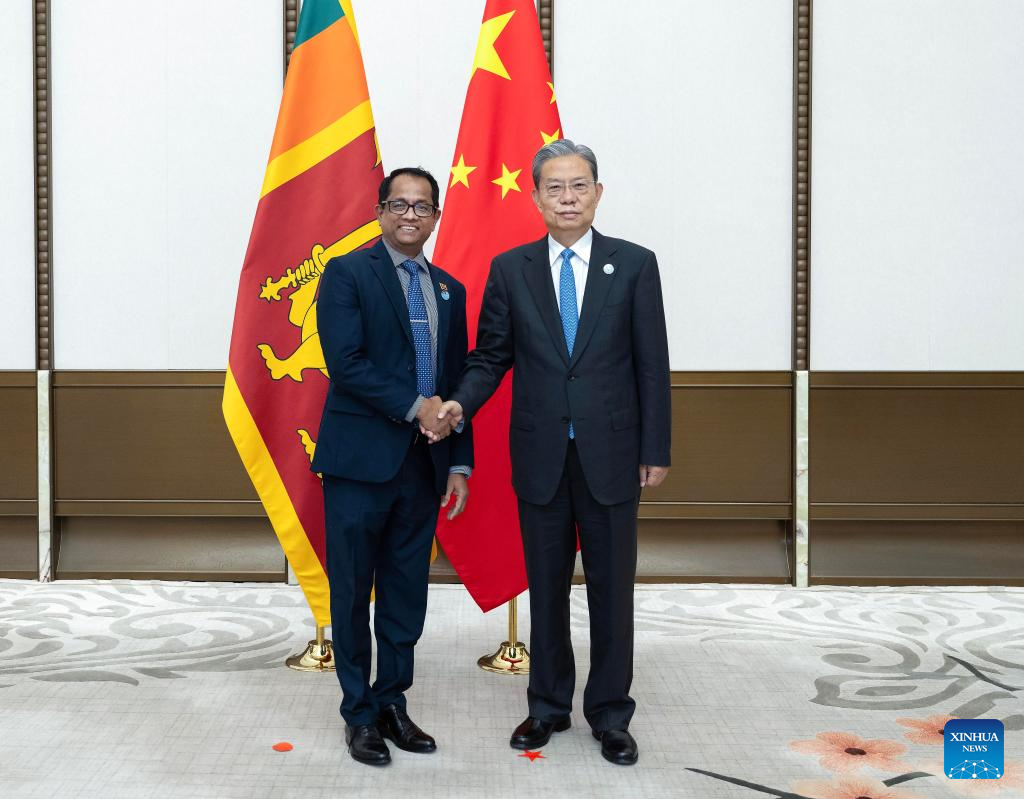 Zhao Leji (R), chairman of the National People's Congress Standing Committee, meets with Sri Lankan Parliament Speaker Jagath Wickramaratne, who is in China for the Boao Forum for Asia Annual Conference 2026, in Boao, south China's Hainan Province, March 26, 2026. /Xinhua