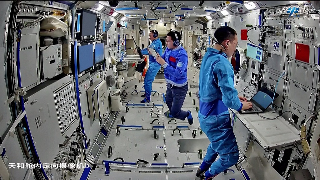 China's Shenzhou-21 crew inside the space station. /CMSA