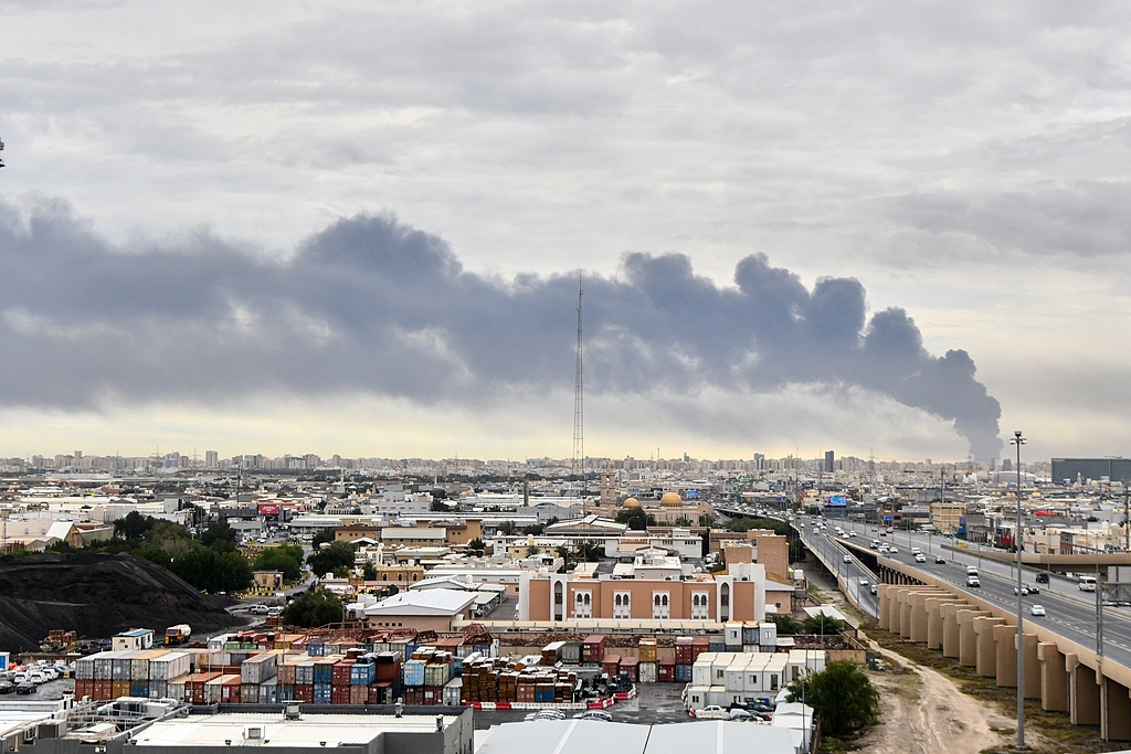 Smoke rises from Kuwait International Airport after a drone strike on fuel storage in Kuwait City, Kuwait, on March 25, 2026. /VCG