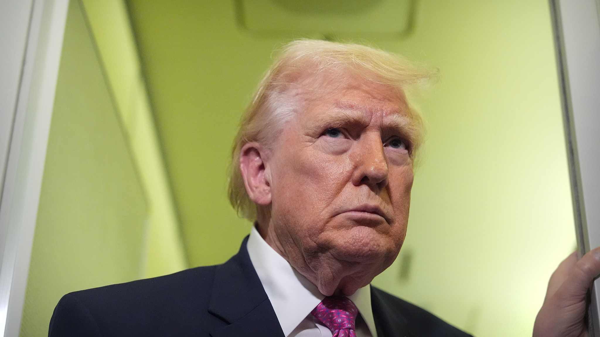 US President Donald Trump speaks to reporters aboard Air Force One, March 29, 2026. /VCG