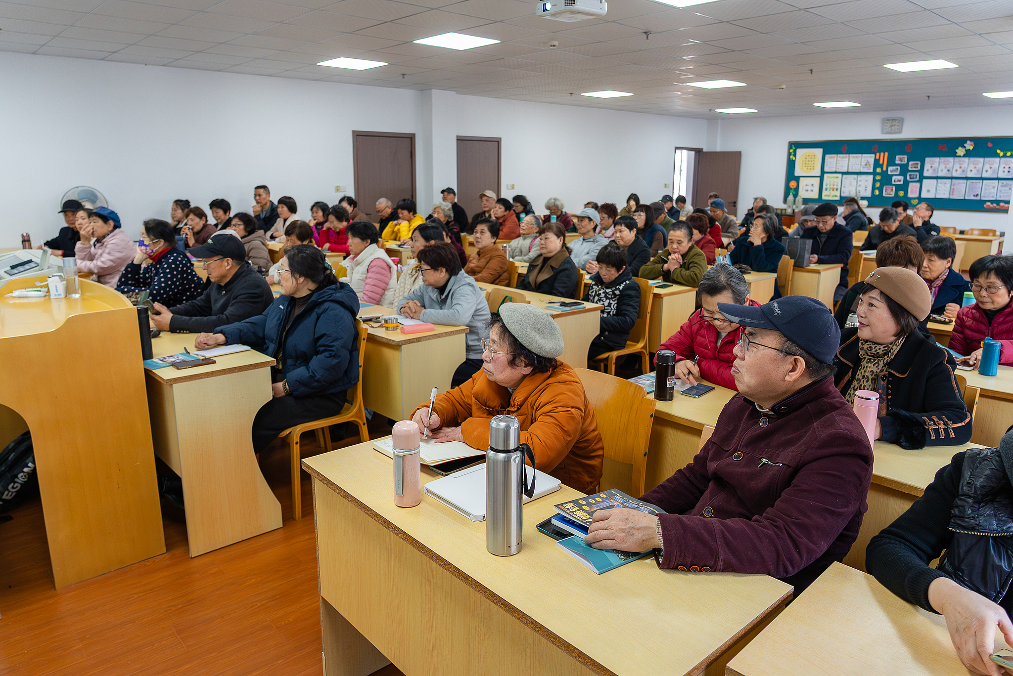 Elders learn to use mobile voice assistants during an 