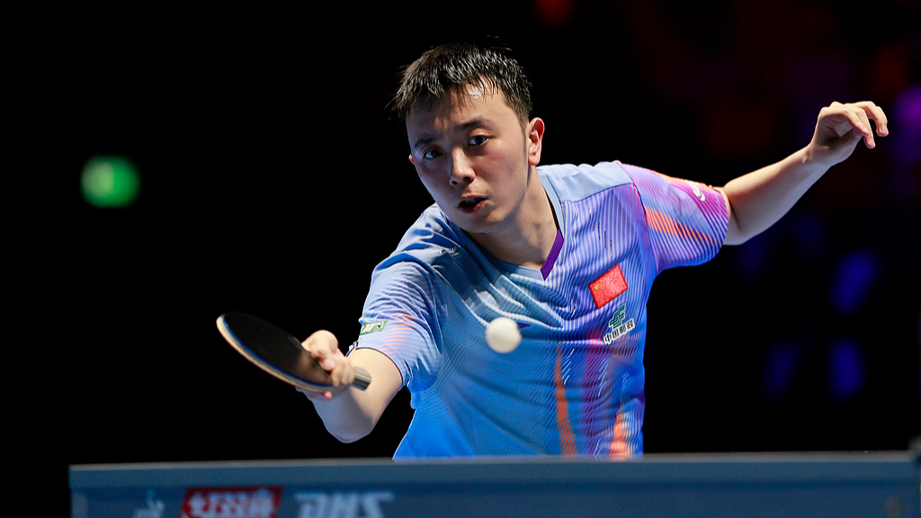Chen Yuanyu of China hits a shot against Dean Shu of New Zealand in a Group 12 men's singles match at the International Table Tennis Federation Men's and Women's World Cup in China's Macao SAR (Special Administrative Region), March 30, 2026. /VCG