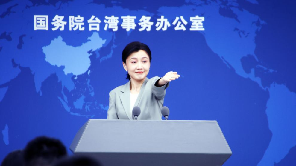 Zhang Han, a spokesperson for the State Council Taiwan Affairs Office, gestures at a press conference in Beijing, capital of China, April 1, 2026. /Xinhua