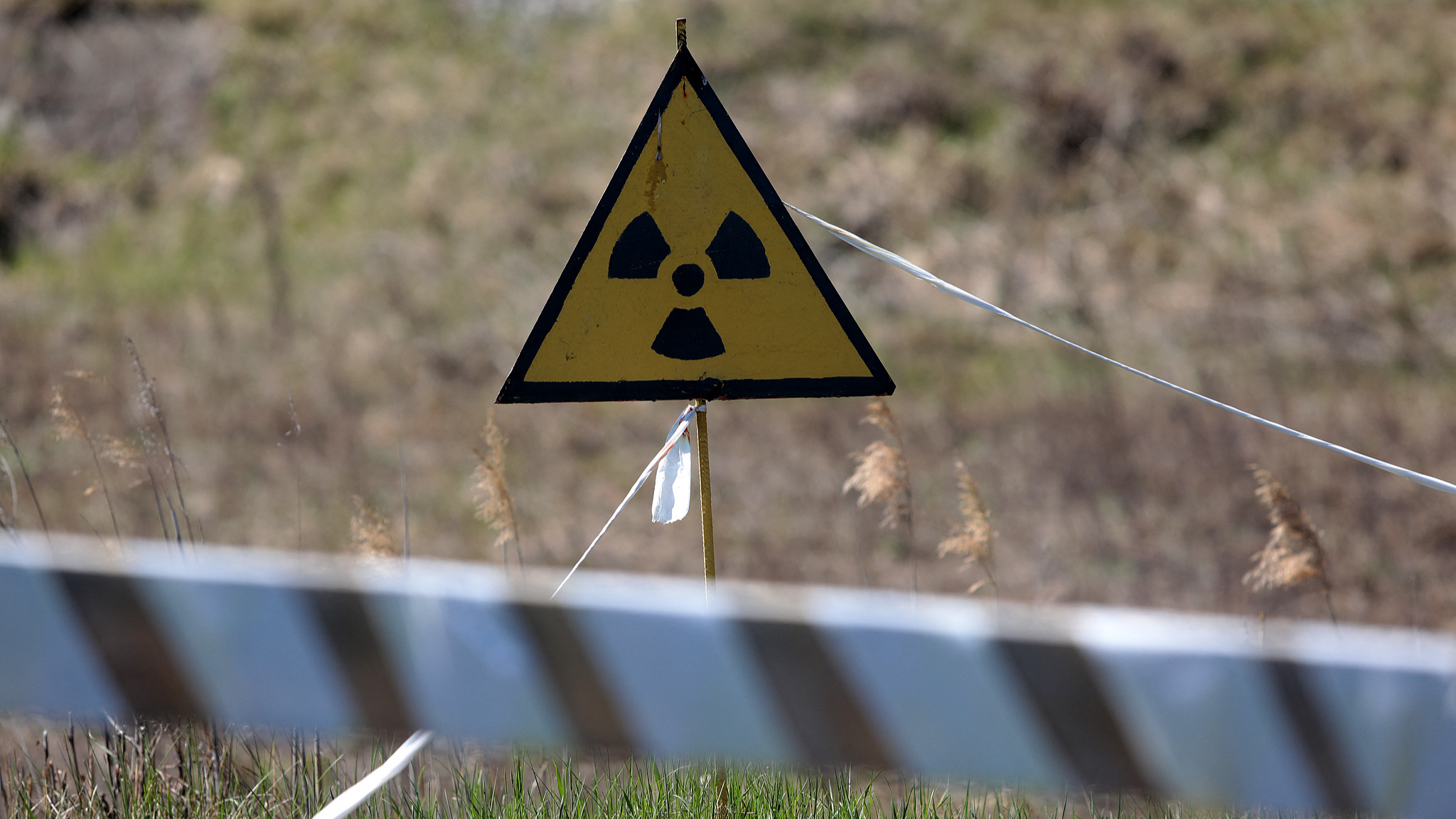 An international ionizing radiation trefoil symbol is pictured at the Red Forest in the Chernobyl Exclusion Zone after the withdrawal of troops, Kyiv Region, northern Ukraine, April 28, 2022. /CFP
