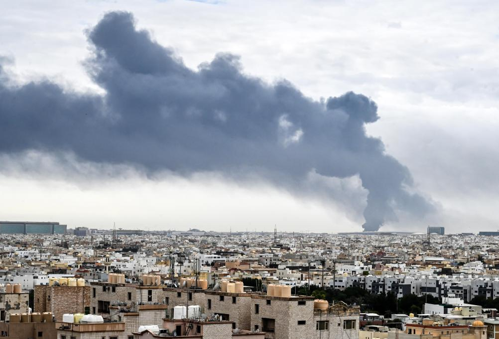 Smoke billows following a strike at a fuel depot at Kuwait International Airport in Farwaniya Governorate, Kuwait, March 25, 2026. /Xinhua