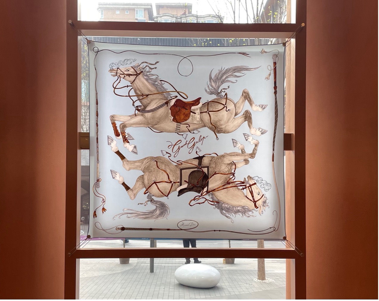 A piece of Hermès silk scarf embodies the freedom and elegance of horses. /CGTN