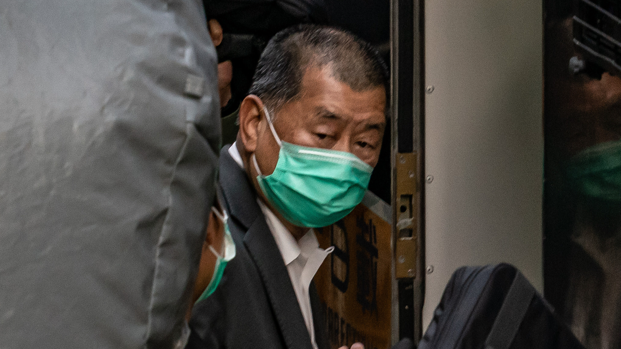 Jimmy Lai boards a Correctional Services Department vehicle as he leaves the Court of Final Appeal following a bail hearing in Hong Kong, China, February 1, 2021. /VCG