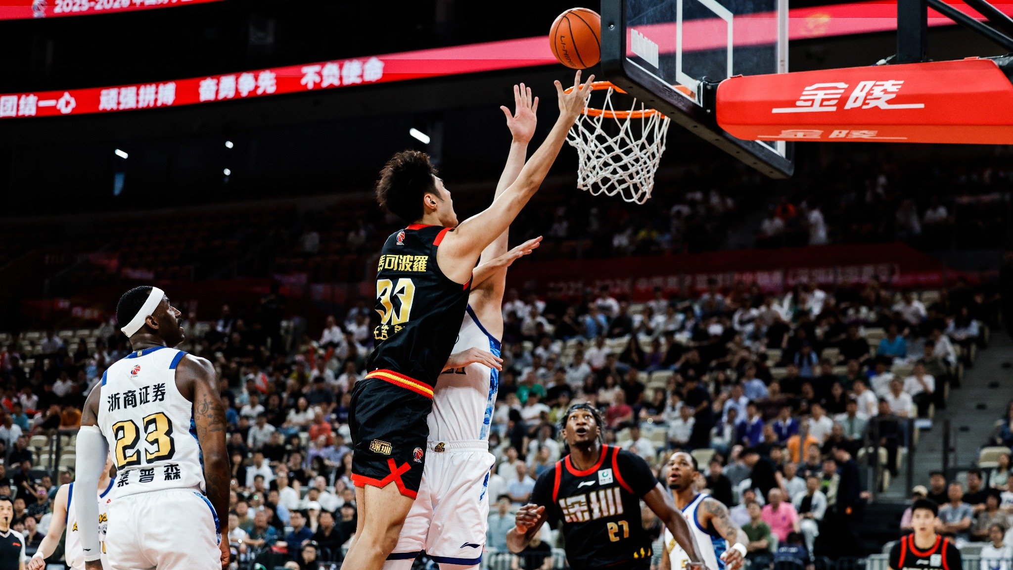 Wang Haoran (#33) of the Shenzhen Leopards scores against the Guangsha Lions in a Chinese Basketball Association game in Shenzhen, south China's Guangdong Province, April 2, 2026. /Shenzhen Leopards