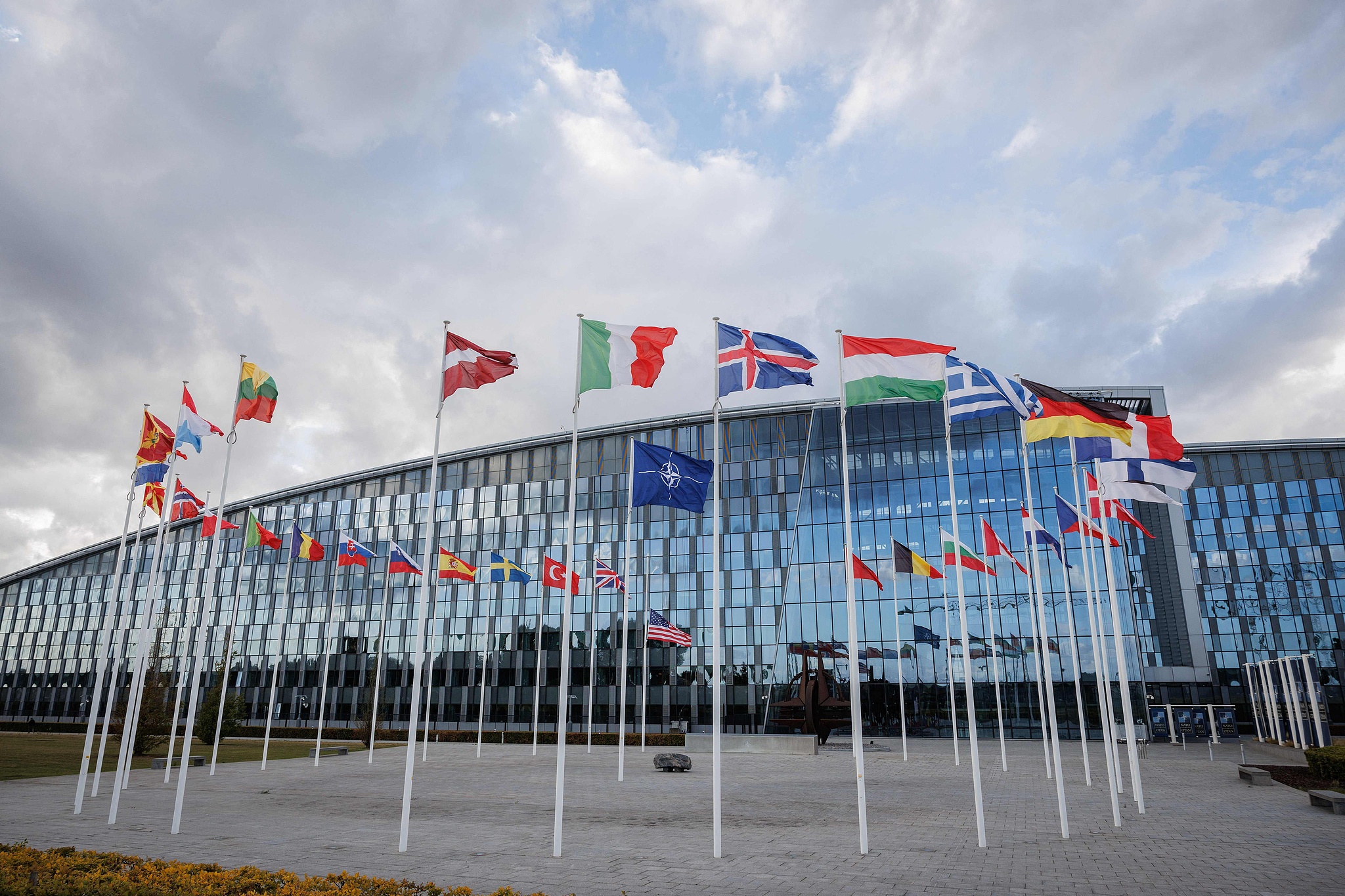 Flags of NATO members fly at the NATO headquarters in Brussels, Belgium, September 12, 2025. /CFP