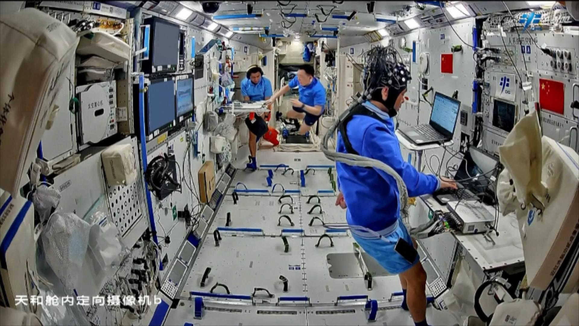 The Shenzhou-21 crew work inside the China Space Station. /via CMG