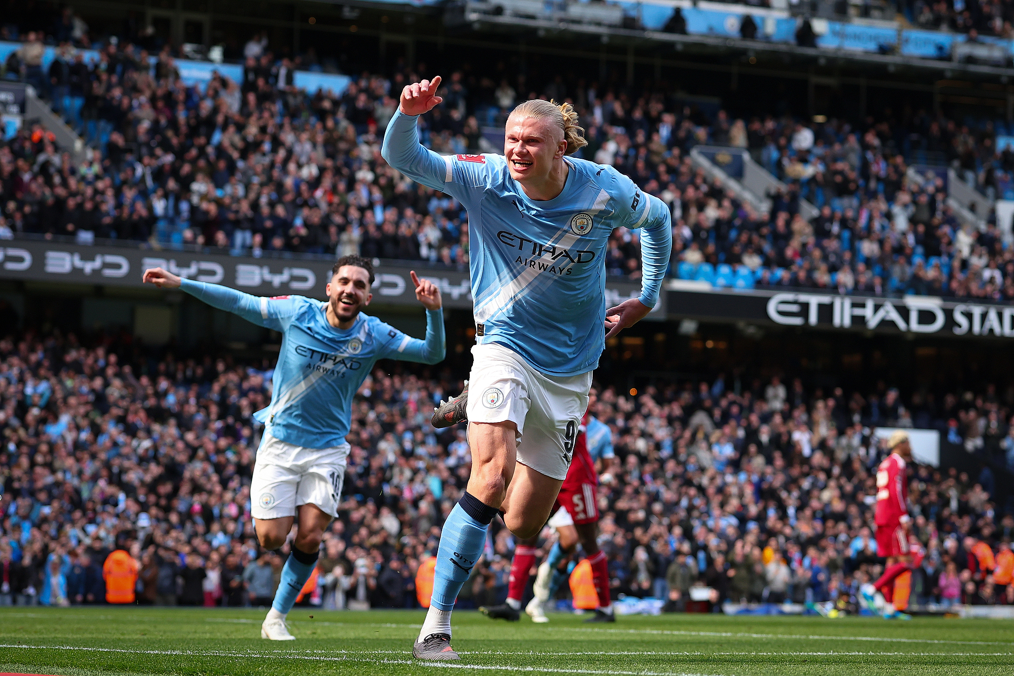 Erling Haaland (#9) of Manchester City celebrates after scoring a goal in the FA Cup quarterfinal match against Liverpool at the Etihad Stadium in Manchester, England, April 4, 2026. /VCG