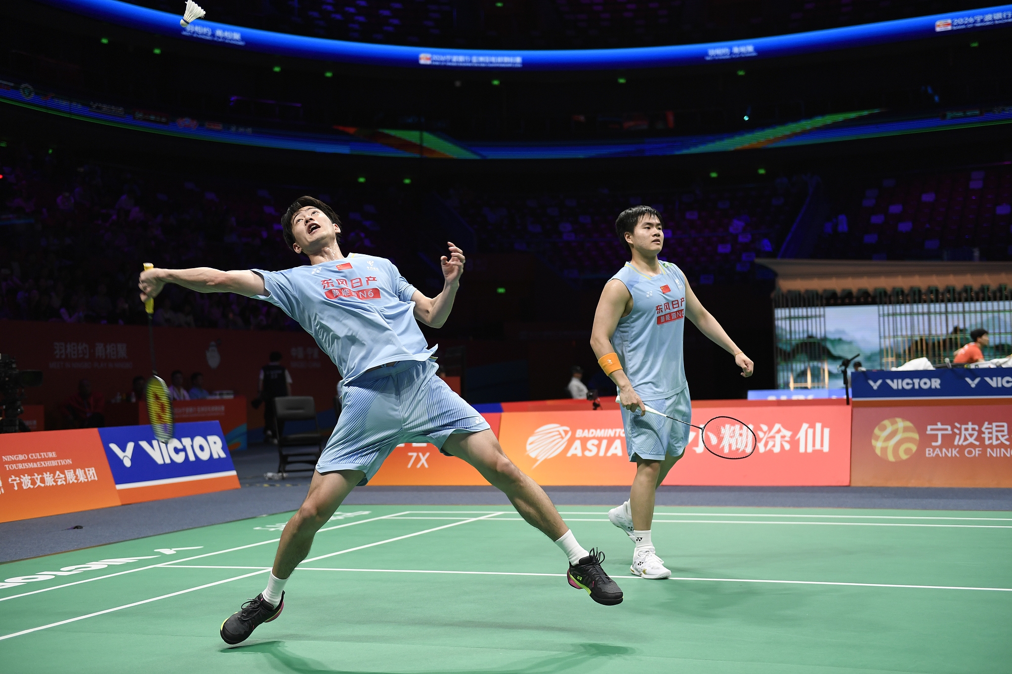 China's Wang Chang (L) and Liang Weikeng compete against Japan's Kakeru Kumagai and Hiroki Nishi in a men's doubles round of 16 match at the Badminton Asia Championships in Ningbo, China, April 9, 2026. /VCG