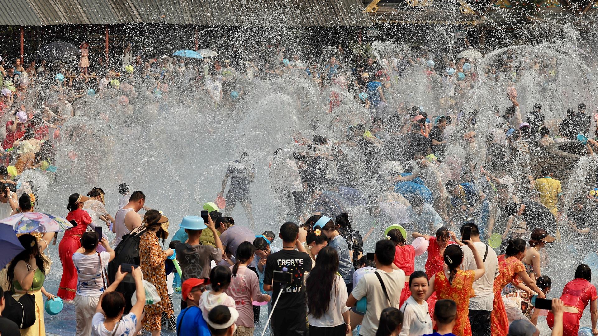 Live: Let's get soaked! Join the Water Splashing Festival