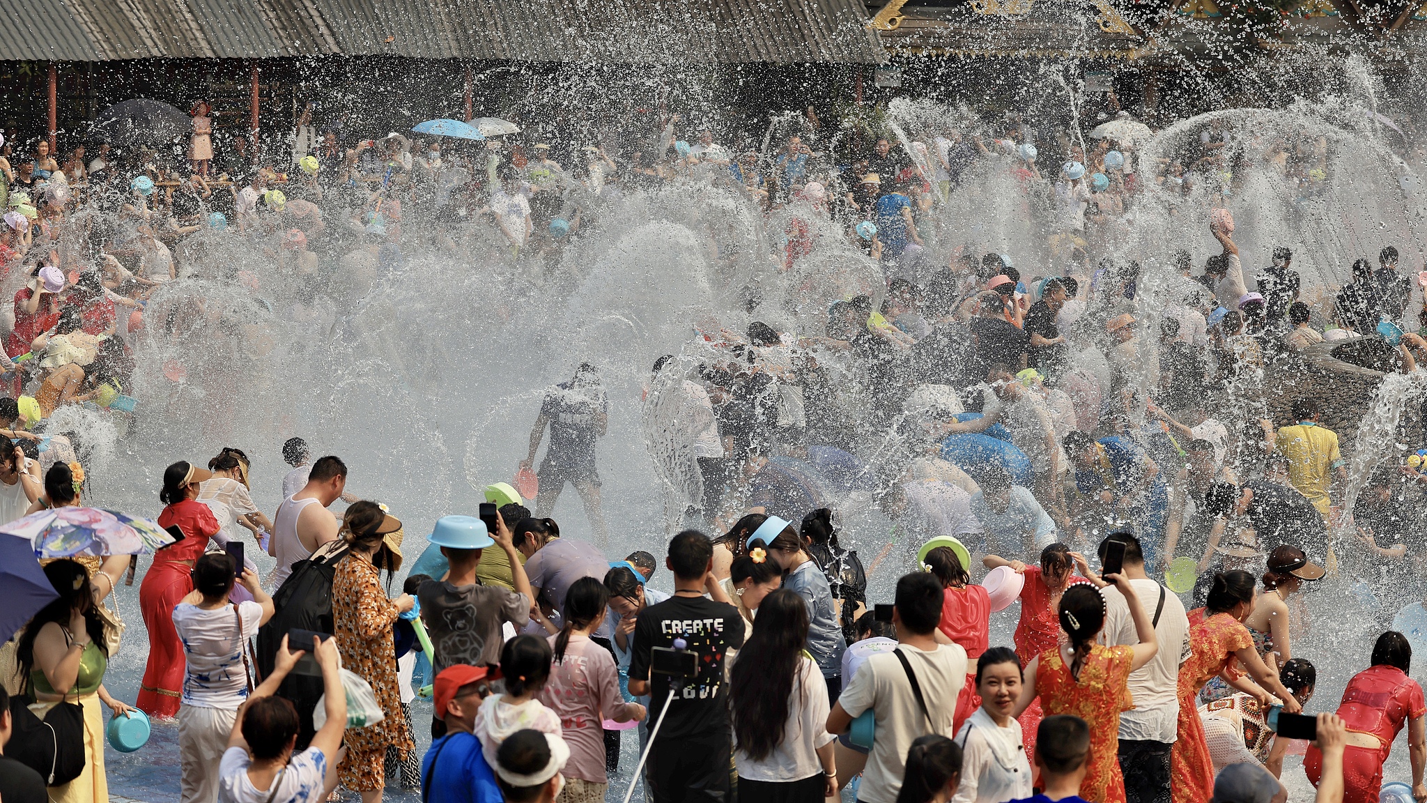 Live: Let's get soaked! Join the Water Splashing Festival