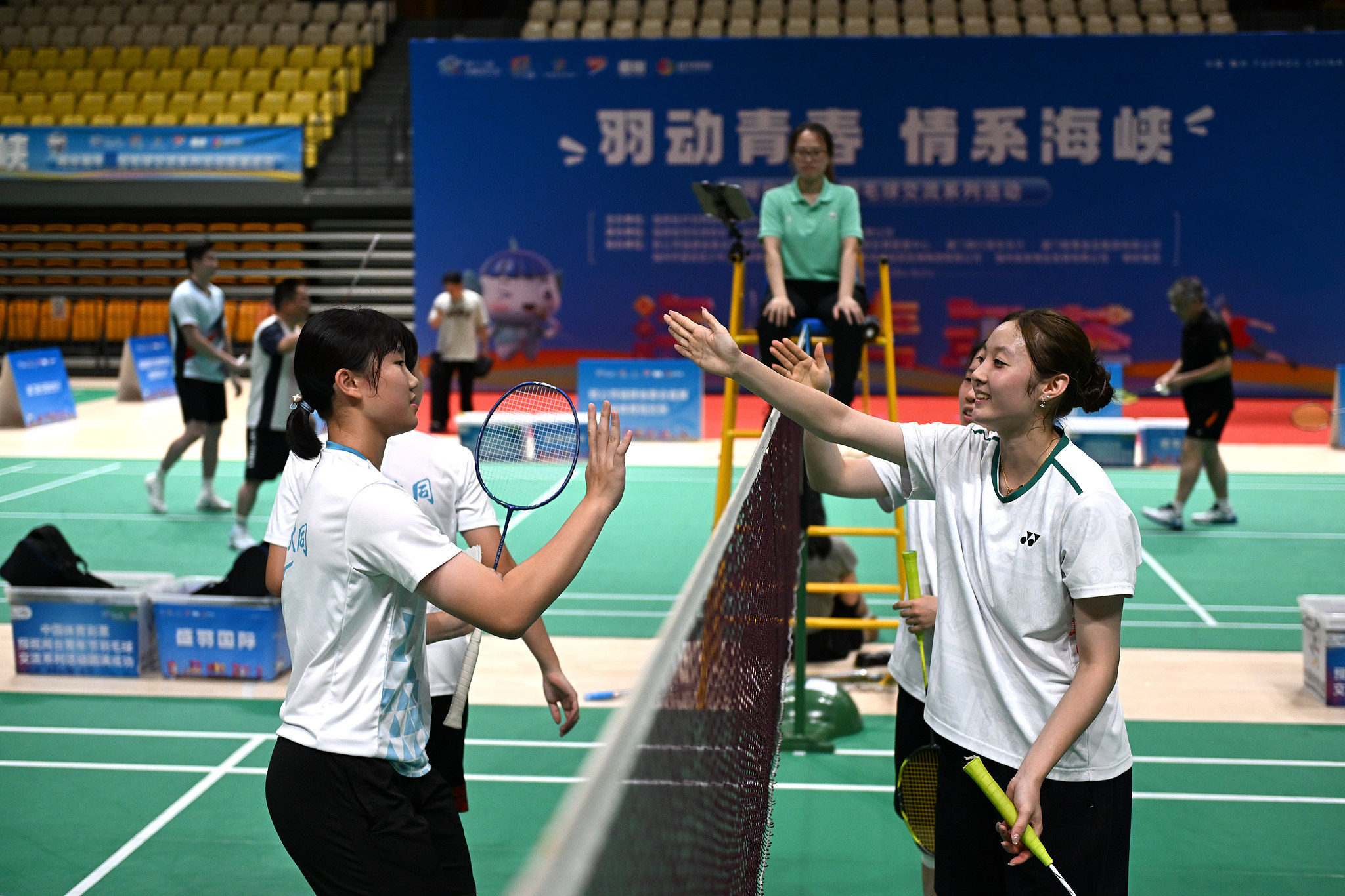 A badminton friendship tournament between youths from Fujian and Taiwan is held in Fuzhou, southeast China's Fujian Province, August 1, 2025. /VCG