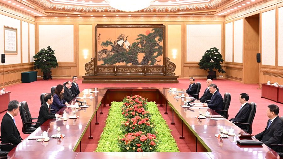 Xi Jinping, general secretary of the Communist Party of China (CPC) Central Committee, meets with a delegation of the Chinese Kuomintang (KMT) party led by its chairwoman Cheng Li-wun in Beijing, capital of China, April 10, 2026. /Xinhua