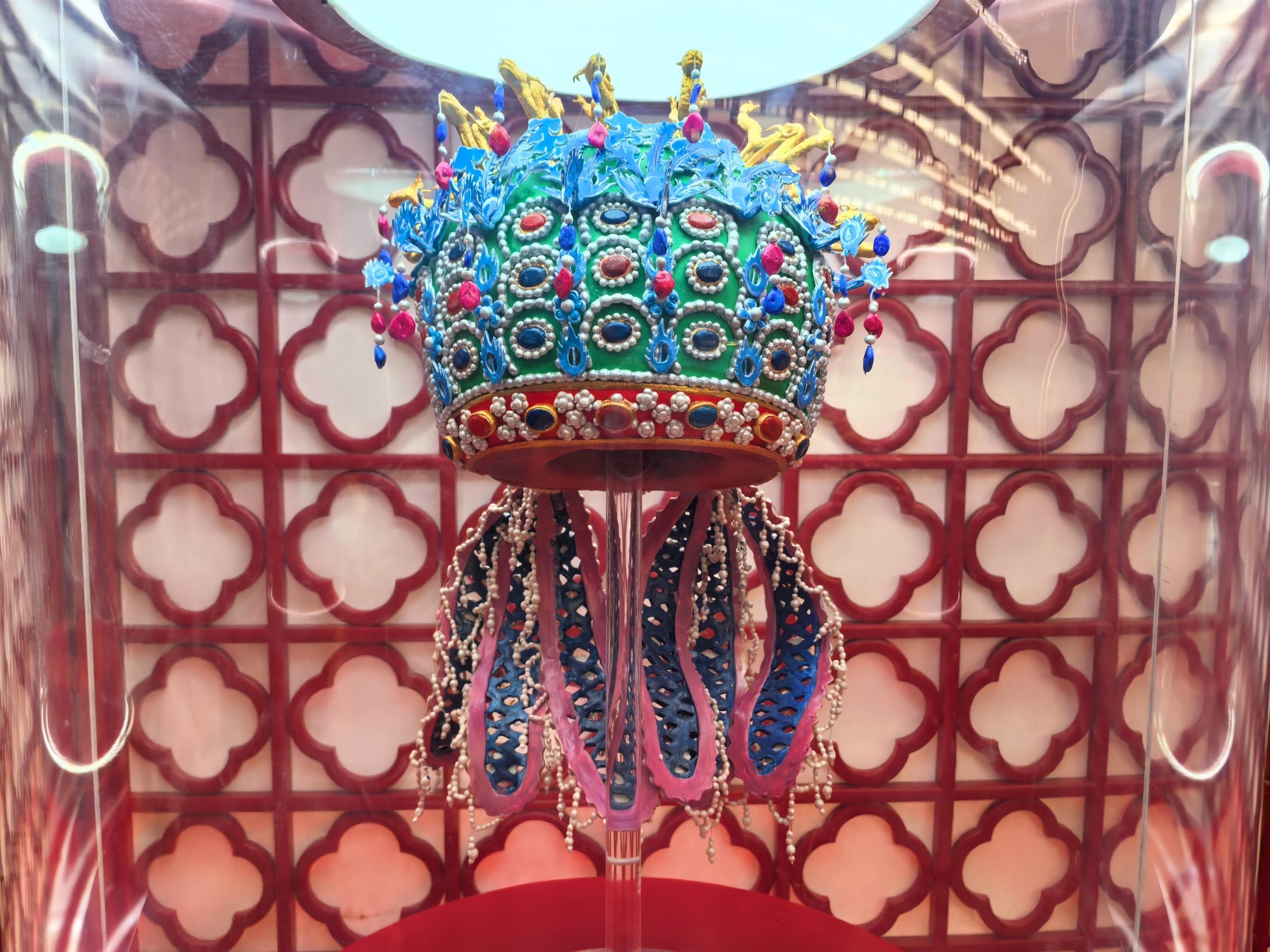 A chocolate replica of the Ming Dynasty's Nine-Dragon and Nine-Phoenix Crown is seen at a chocolate museum in Beijing on April 6, 2026. /CGTN