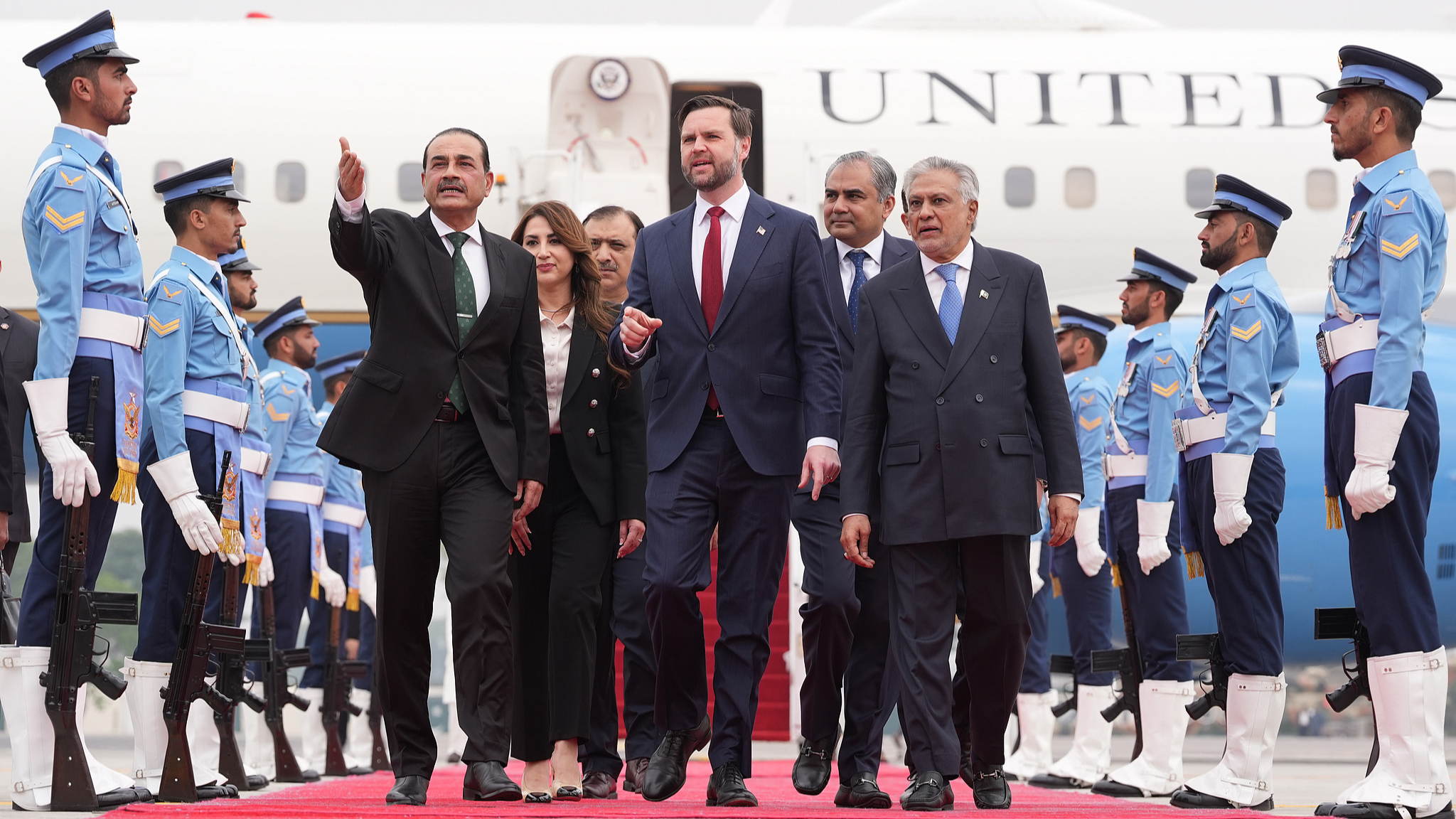 US Vice President JD Vance (C) walks with Pakistan's Chief of Defense Forces and Chief of Army Staff Field Marshall Asim Munir (L), and Pakistani Deputy Prime Minister and Foreign Minister Mohammad Ishaq Dar after arriving for talks with Iranian officials in Islamabad, Pakistan, April 11, 2026. /VCG