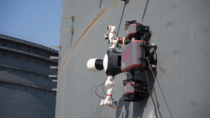 Embodied AI robot on the wall of a large chemical storage tank for task operation. /CCTV PLus