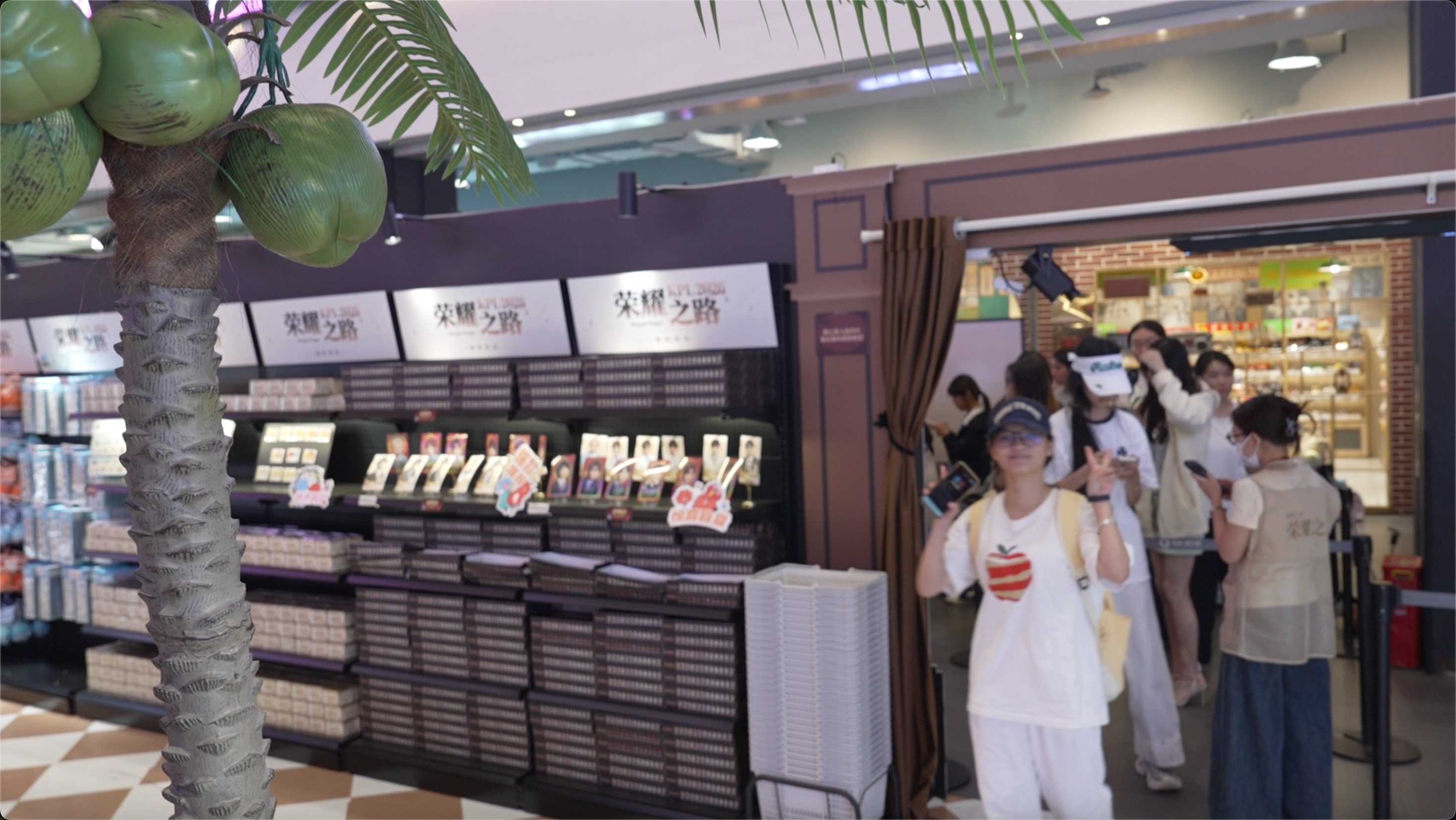 Hainan's iconic coconut palm molds are displayed at the exit of the pop-up store in Haikou Friendship Sunshine City in Haikou, south China's Hainan Province, April 10, 2026. /CGTN