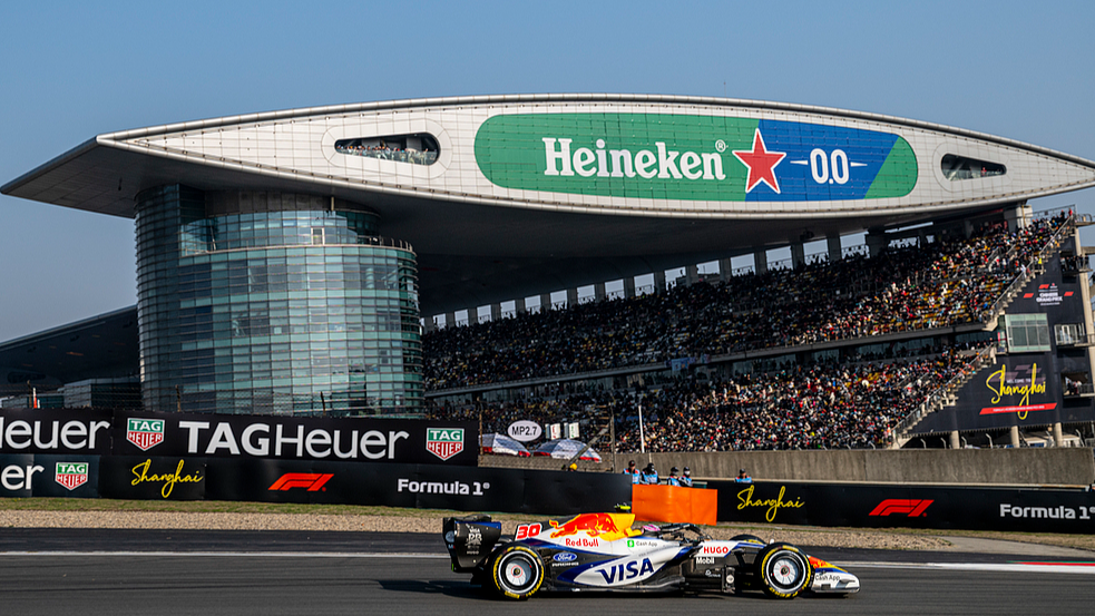 People watch the Formula One Chinese Grand Prix in Shanghai, March 14, 2026. /VCG