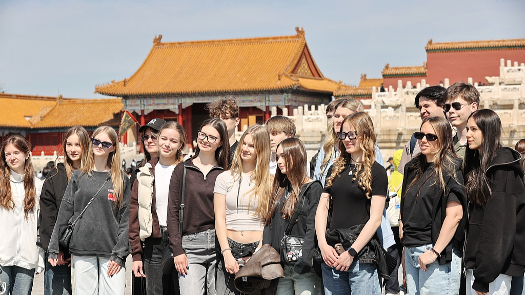 Foreign tourists visit the Palace Museum in Beijing, April 1, 2026.