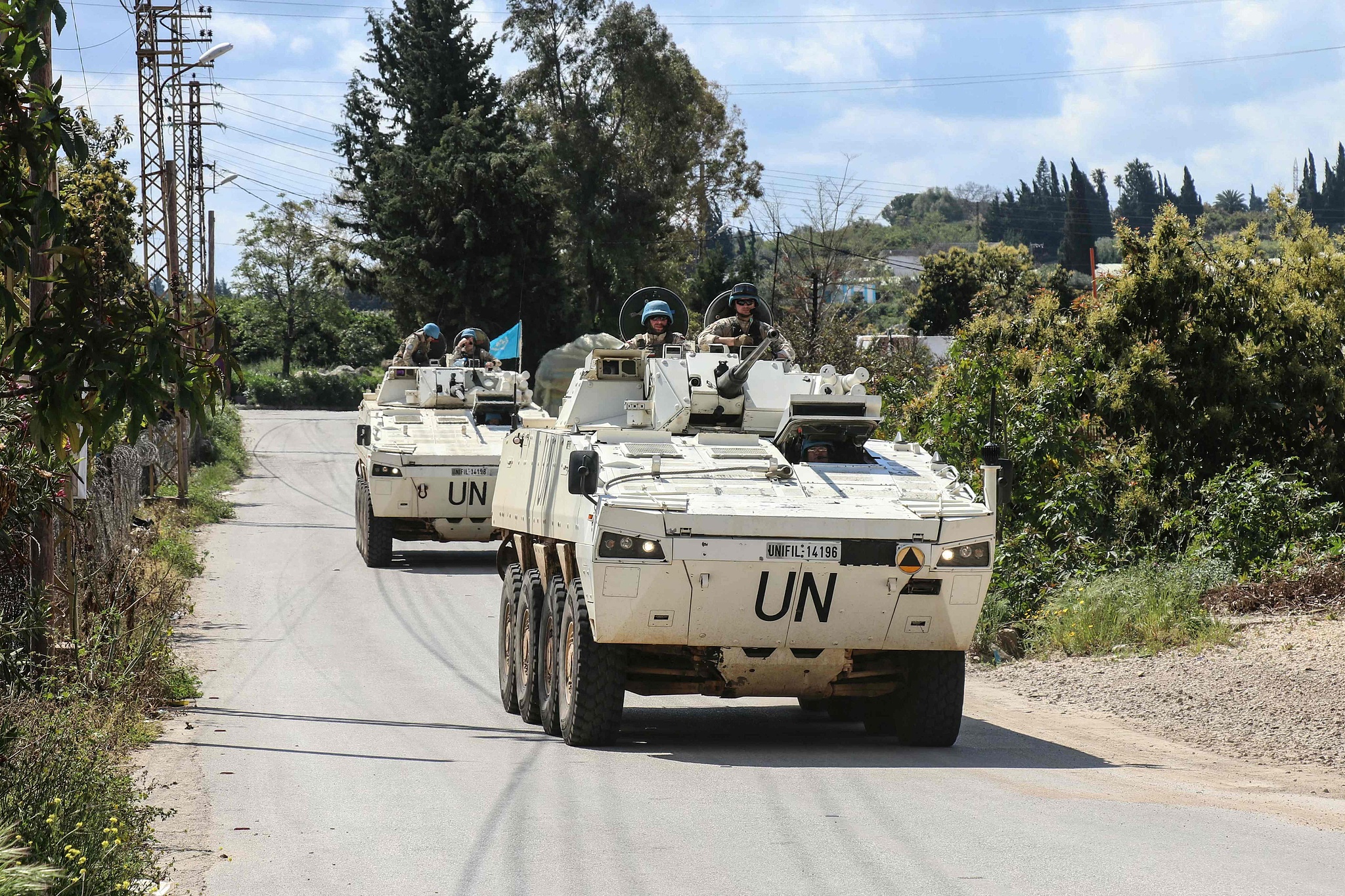 Members of the UN peacekeeping force in Lebanon (UNIFIL), in armored vehicles, patrol the road of the southern Lebanese village of Tair Debba, April 12, 2026. /VCG