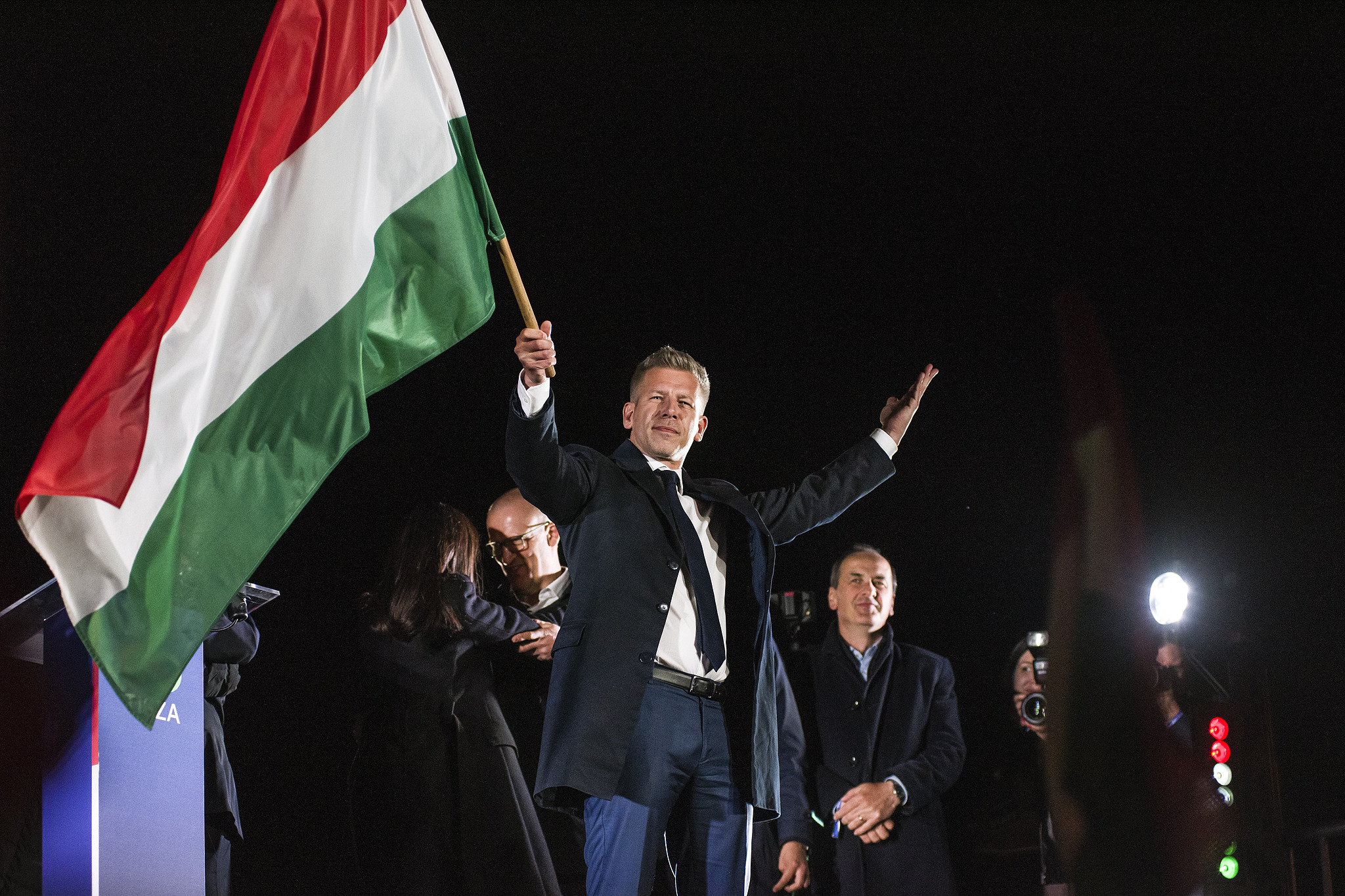 Peter Magyar waves the Hungarian flag after his speech during the Hungarian Civic Alliance (FIDESZ) party's election night event in Budapest, Hungary, April 12, 2026. /VCG