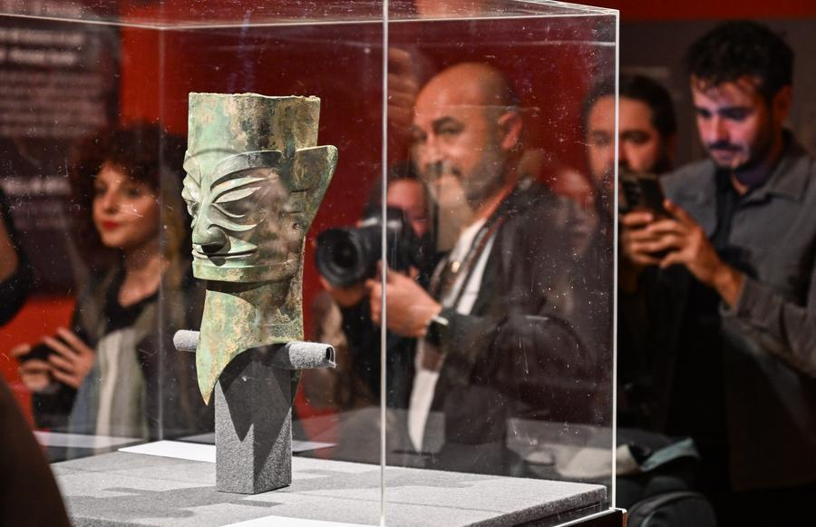 People view a bronze human head from the Sanxingdui archaeological site during an exhibition on the bronze civilization of southwest China at the Guadalajara Museum in Guadalajara, Spain, March 17, 2026. /Xinhua