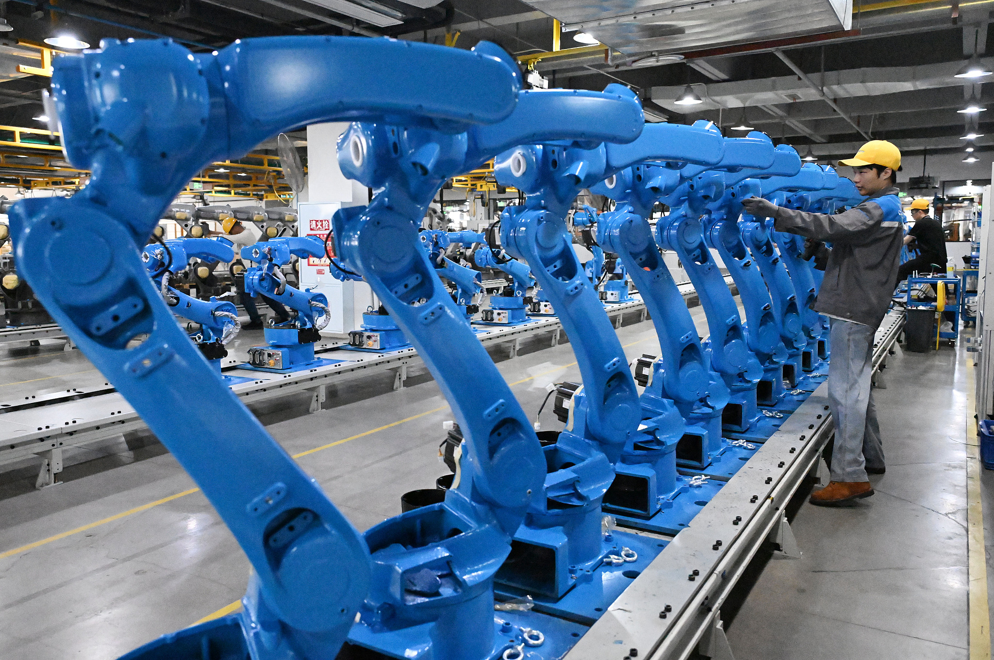 In the production workshop of Chengdu Canop Company, workers were assembling industrial robots, Chengdu City, Sichuan Province, April 8, 2026. /VCG