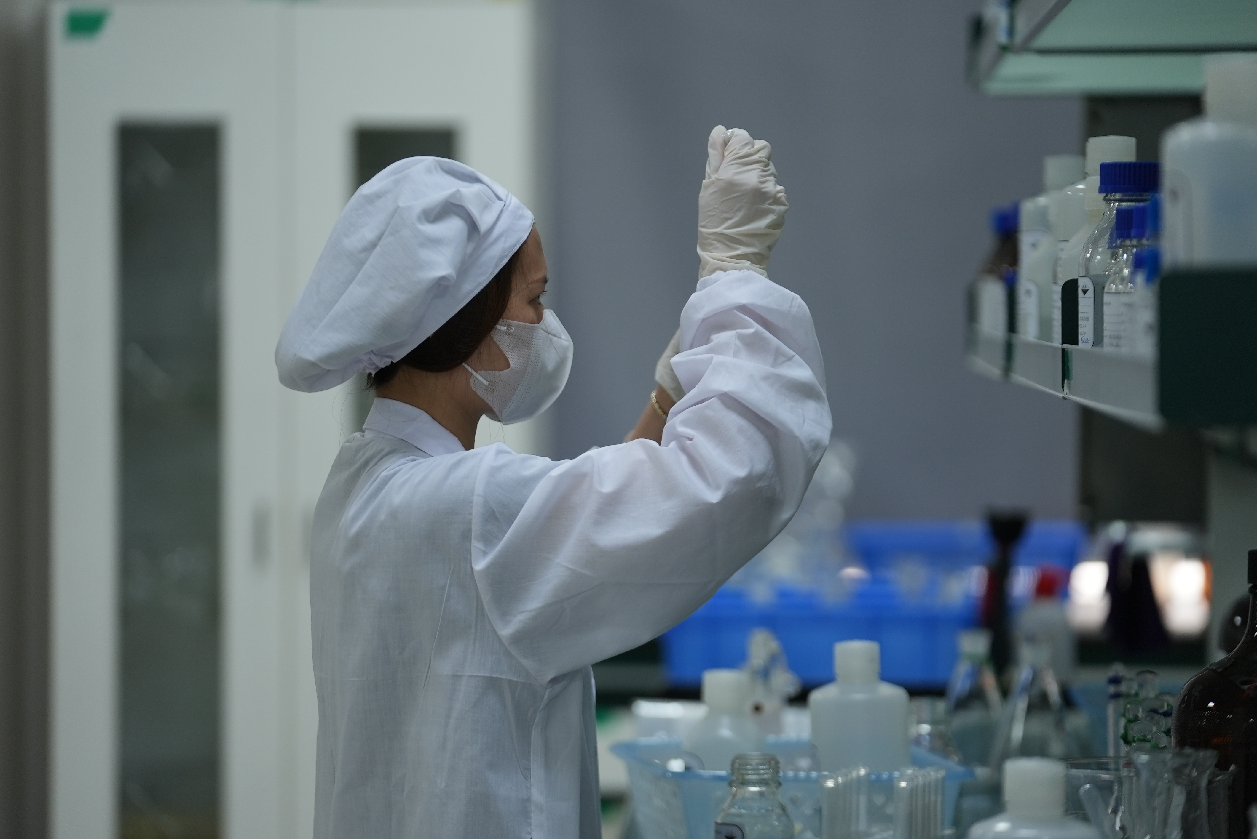 A researcher conducts specialized laboratory experiments at a biotech firm located in the Haikou National High-Tech Industrial Development Zone, April 13, 2026. /CGTN