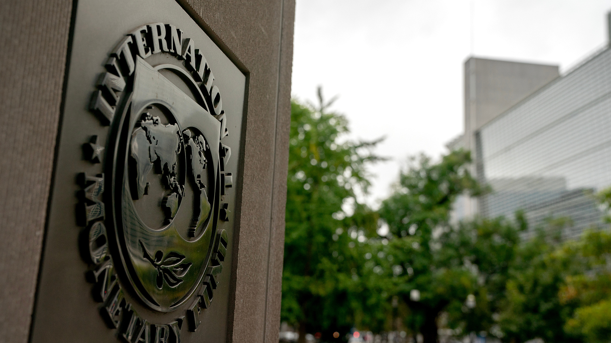 A view of the International Monetary Fund (IMF) signage outside the IMF headquarters in Washington DC, United States, October 12, 2025. /VCG