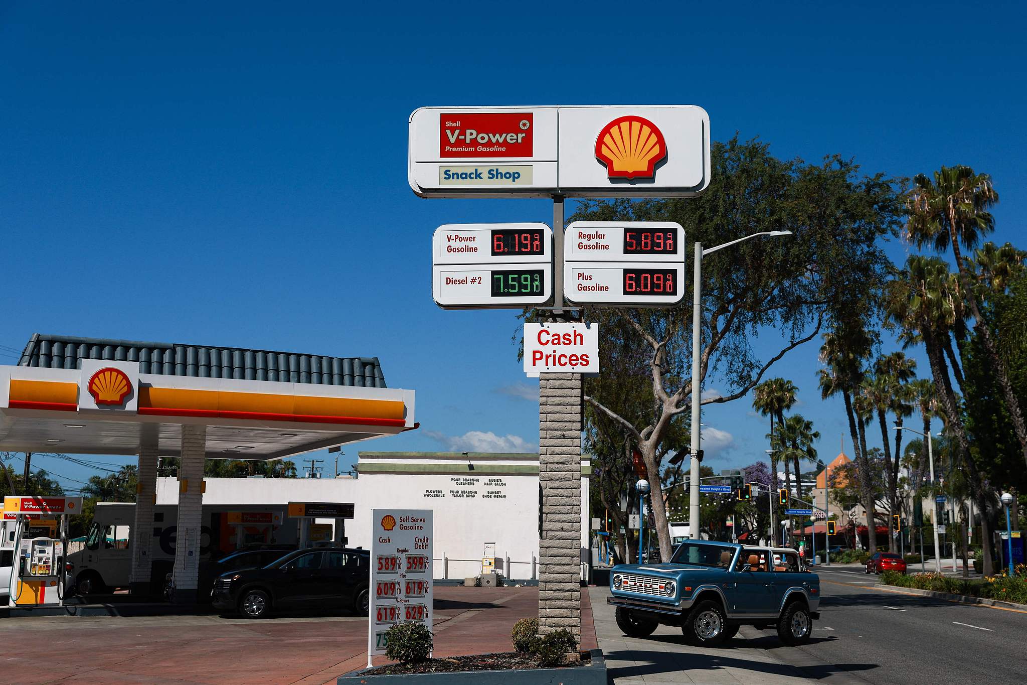Premium gasoline prices above $6 per gallon and diesel fuel prices above $7 a gallon are displayed outside of a Shell gas station in West Hollywood, California, United States, April 14, 2026. /VCG