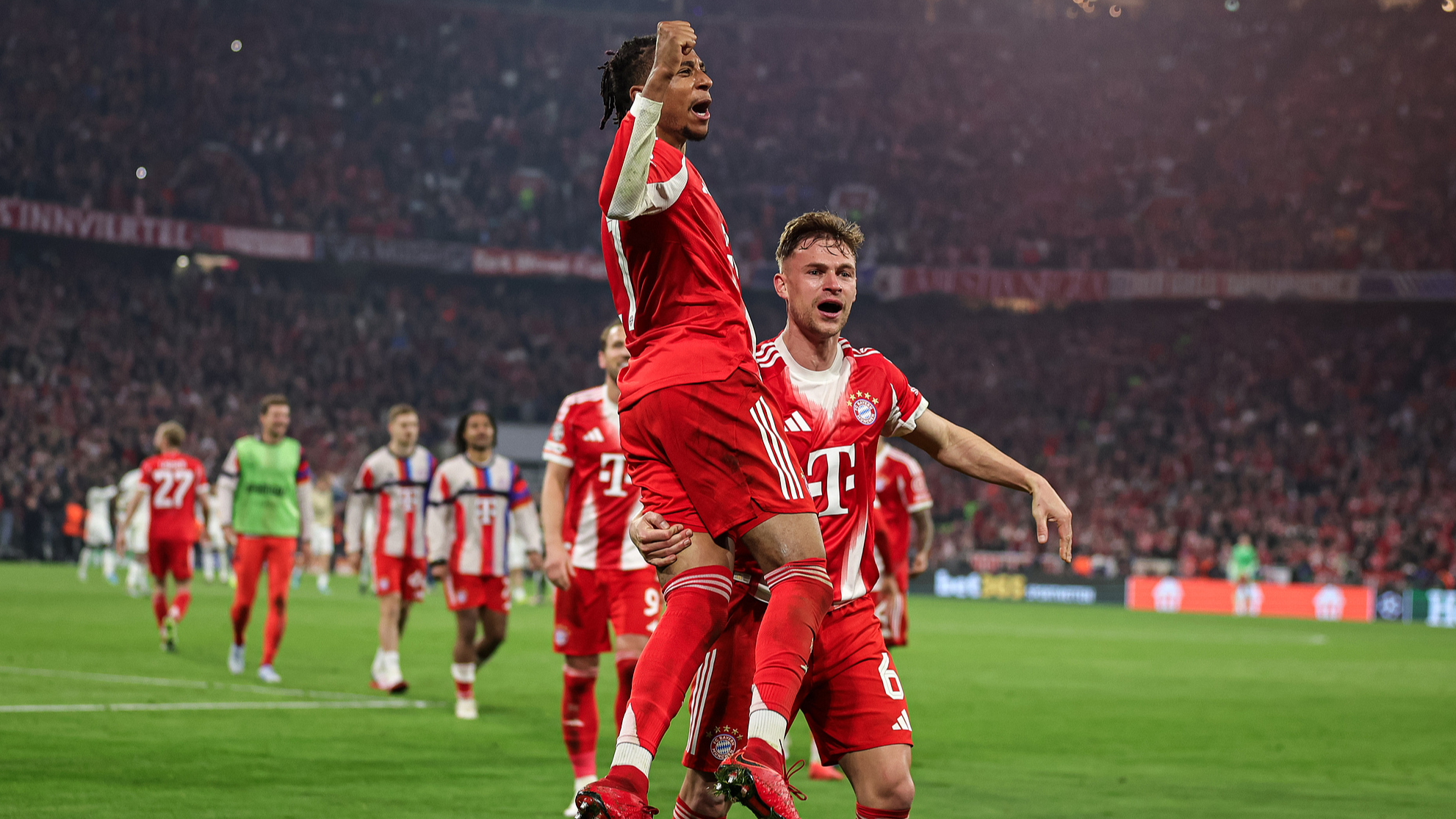 Michael Olise (L) and Joshua Kimmich celebrate after helping Bayern Munich beat Real Madrid in a UEFA Champions League quarterfinal second leg match in Munich, Germany, April 15, 2026. /VCG