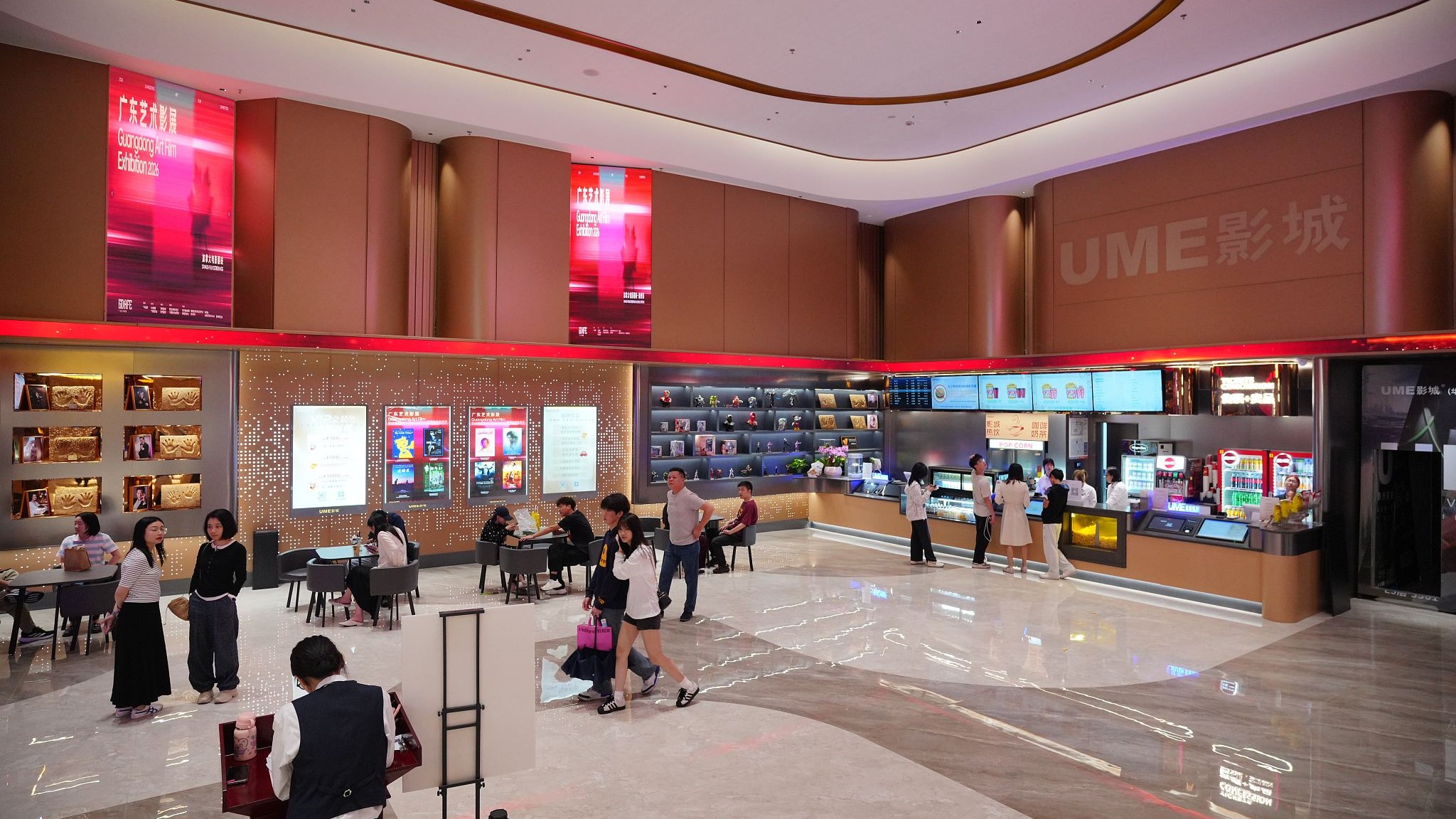 Moviegoers gather outside a cinema in a shopping mall in Huizhou City, south China's Guangdong Province, April 5, 2026. /VCG