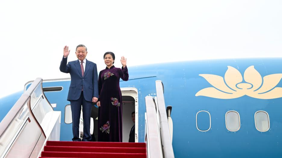 To Lam, general secretary of the Communist Party of Vietnam Central Committee and president of Vietnam, and his wife arrive in Beijing, capital of China, April 14, 2026. /Xinhua
